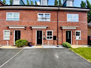 Front Elevation/Driveway- click for photo gallery